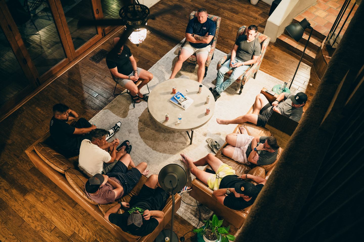 Mastermind members seated together in a circle, seen from above