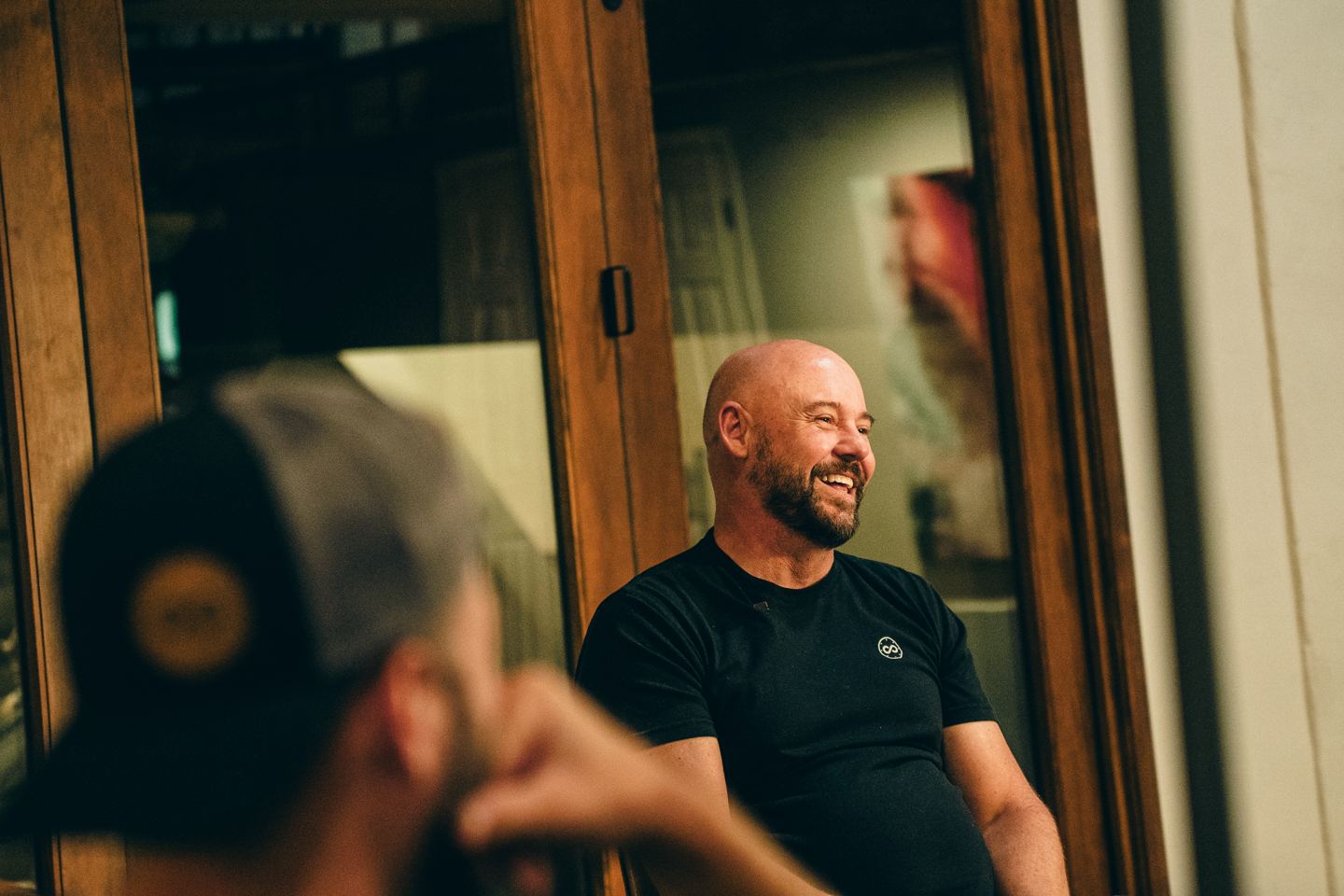 Shawn Feurer laughing with the group during a mastermind